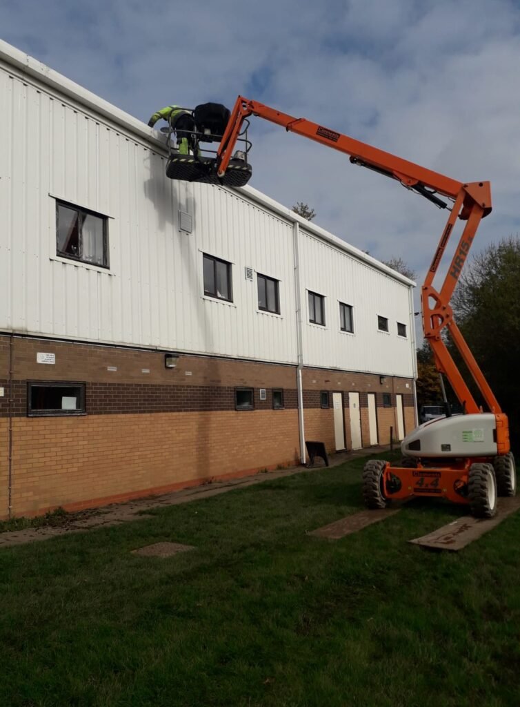 Commercial Gutter Cleaning Using Scissor and Boom Lift